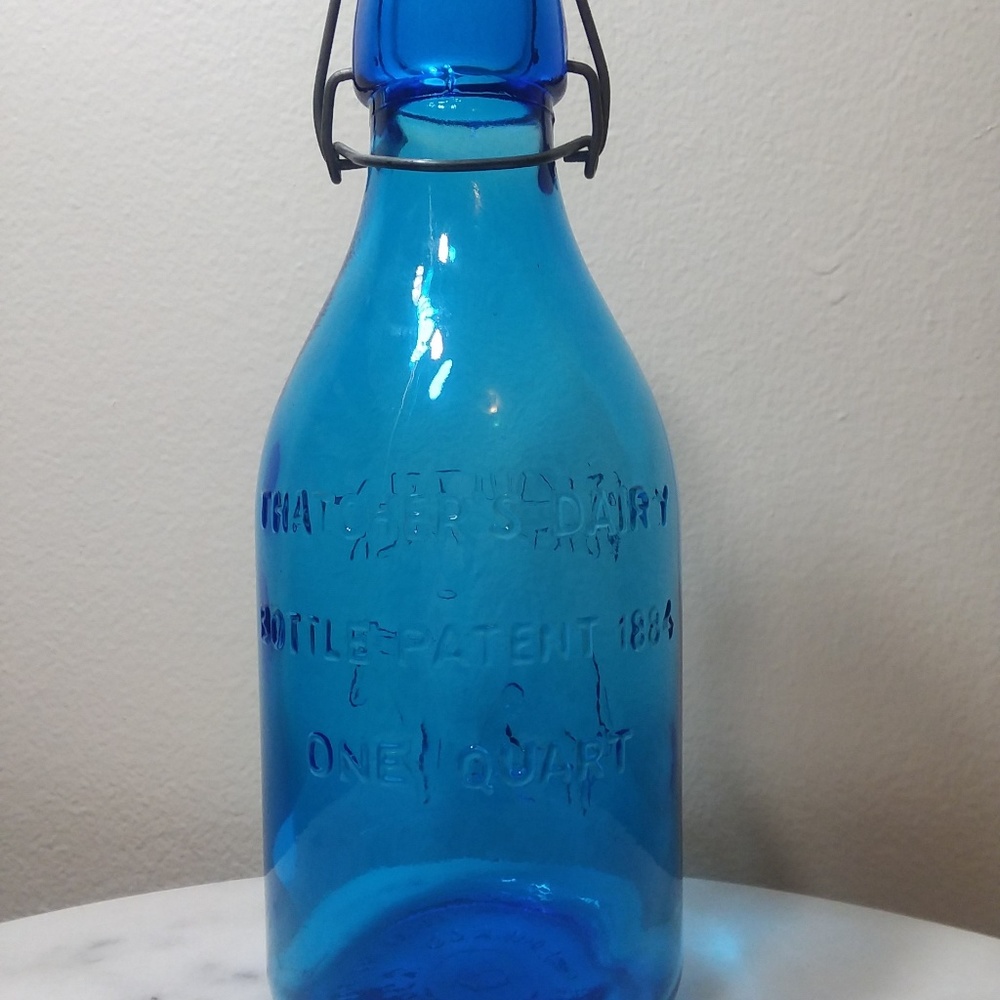 blue glass milk bottle 1965